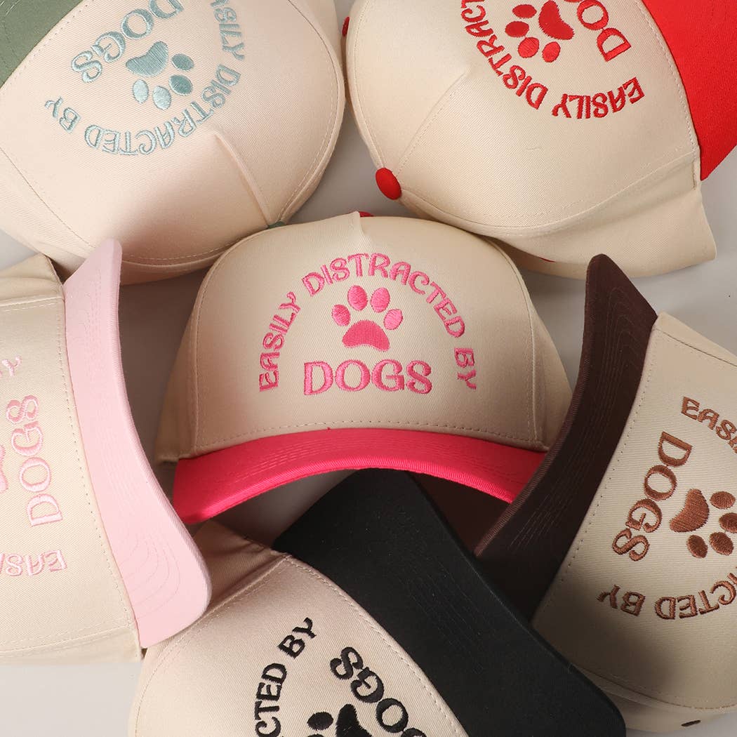 EASILY DISTRACTED BY DOGS Trucker Hat