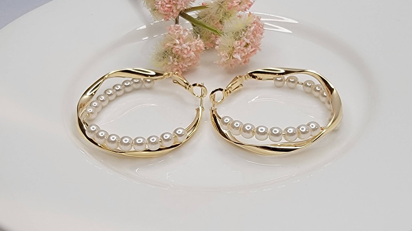 BETTYOH INC - PEARL DECORATED CRISS CROSS GOLD HOOP EARRINGS.