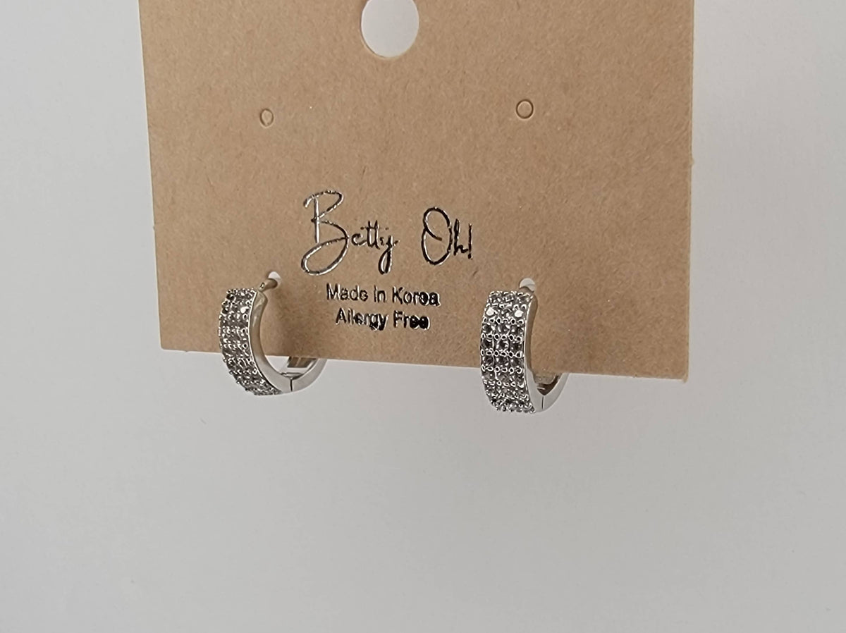 BETTYOH INC - CZ SMALL CLICKER EARRINGS.