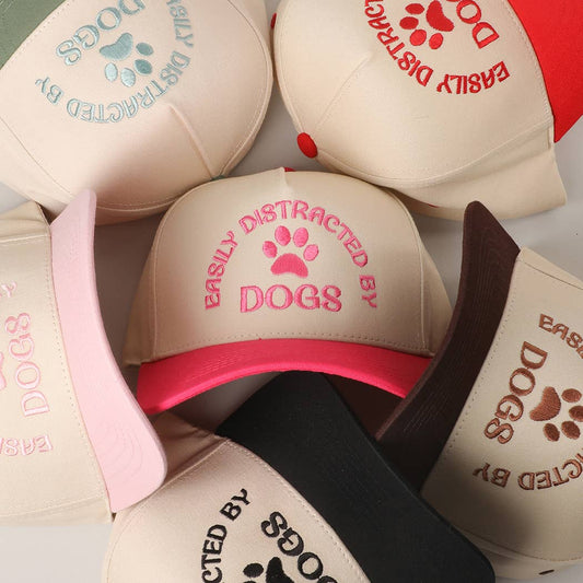 EASILY DISTRACTED BY DOGS Trucker Hat