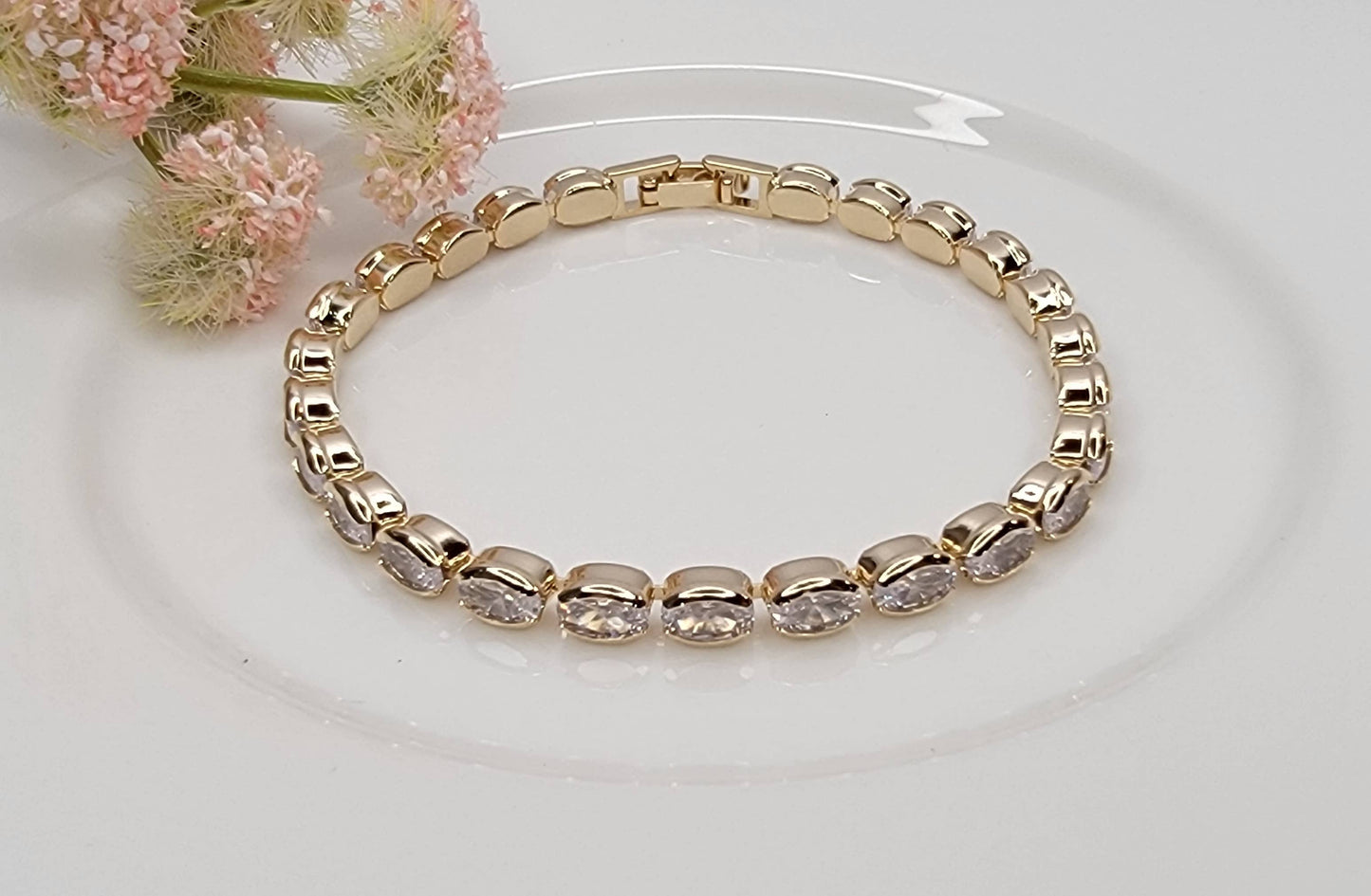 BETTYOH INC - OVAL CZ TENNIS BRACELET.