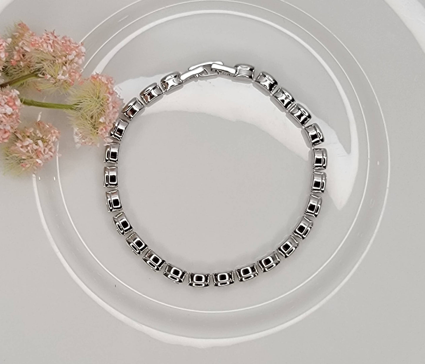 BETTYOH INC - OVAL CZ TENNIS BRACELET.