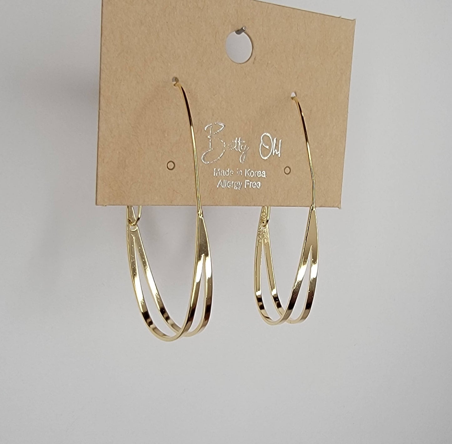 BETTYOH INC - HOOP EARRINGS.