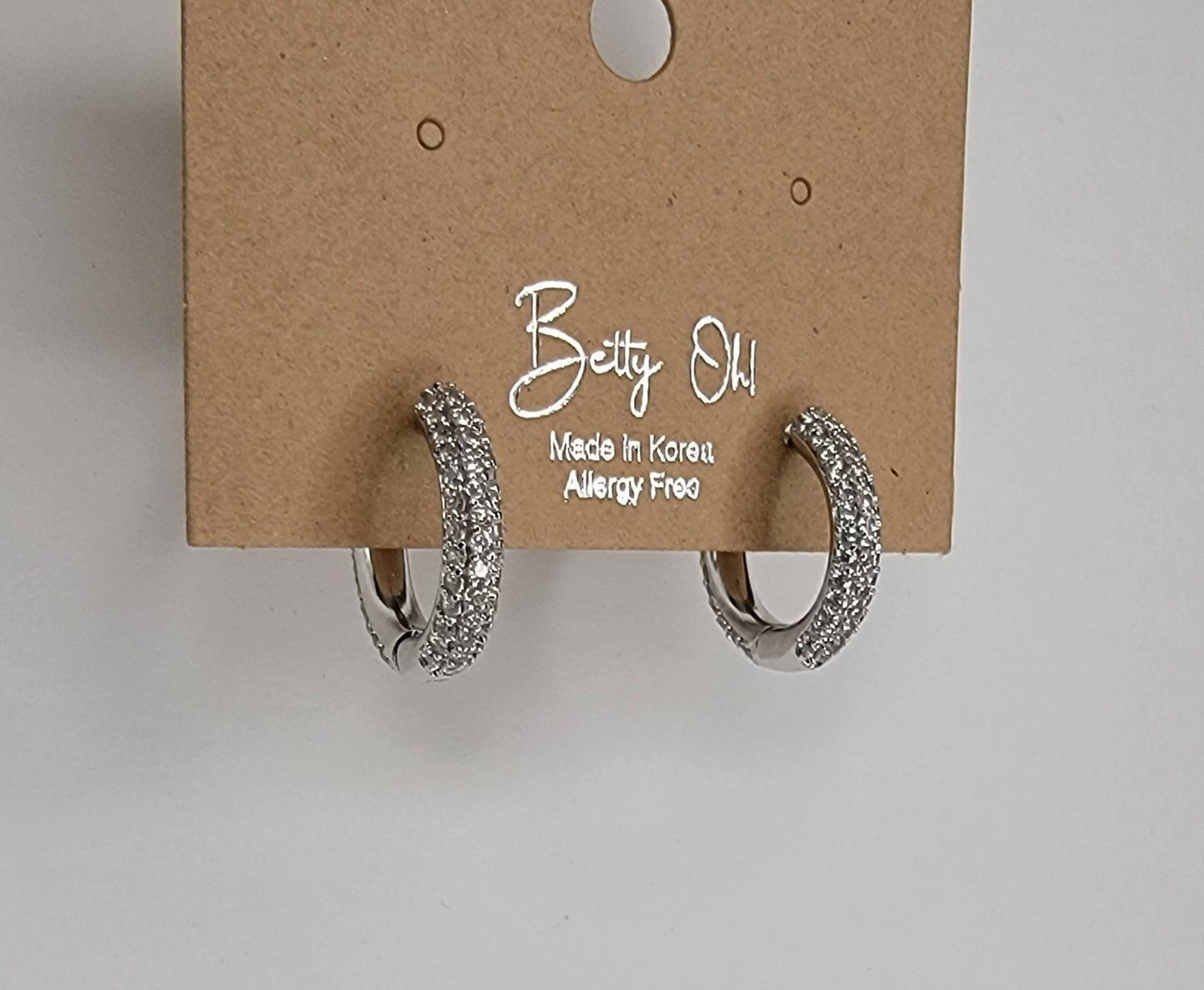 BETTYOH INC - CLICKER EARRINGS.
