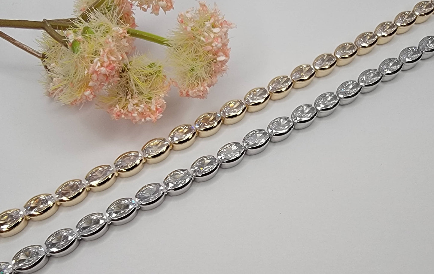 BETTYOH INC - OVAL CZ TENNIS BRACELET.