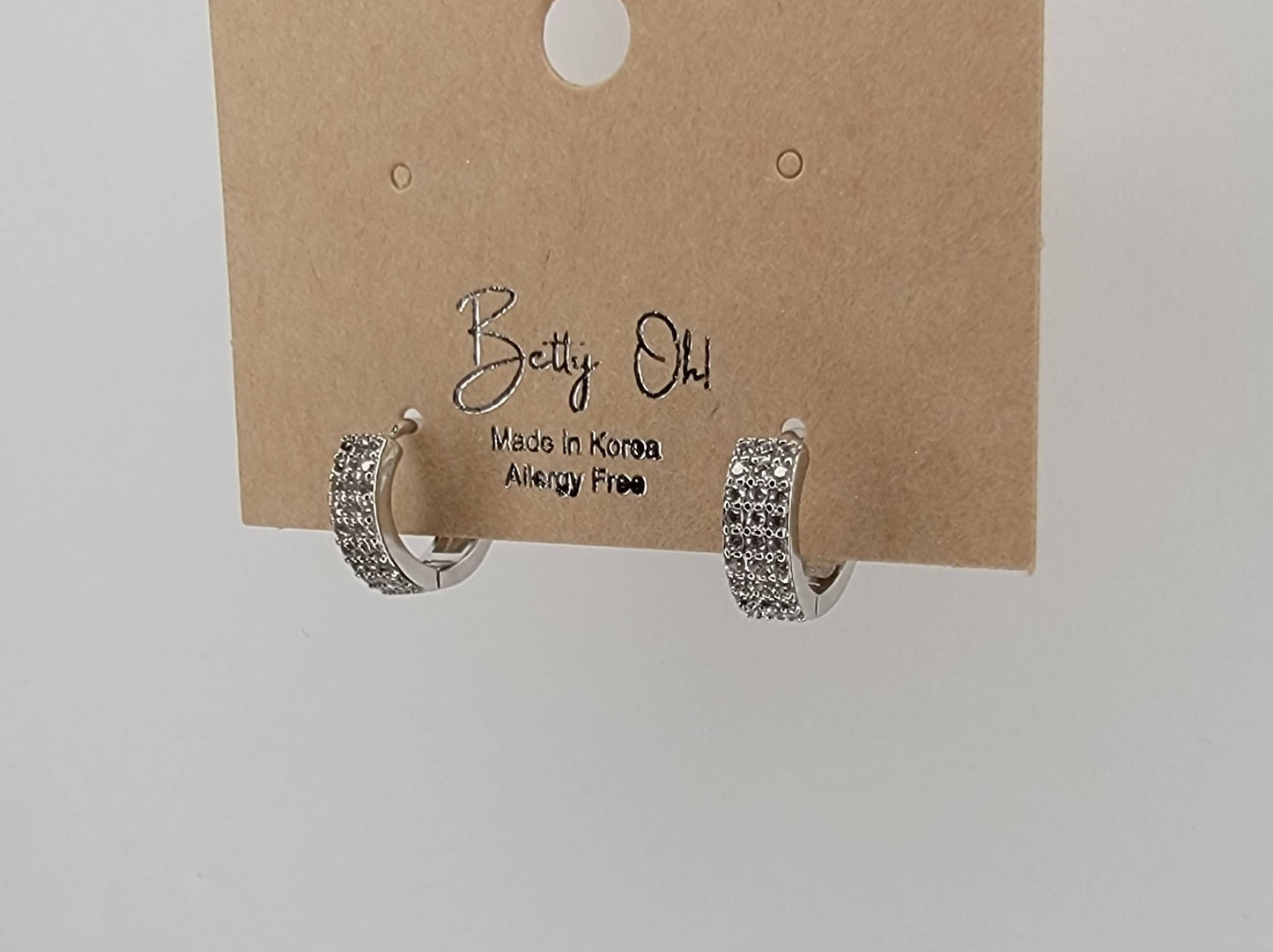 BETTYOH INC - CZ SMALL CLICKER EARRINGS.