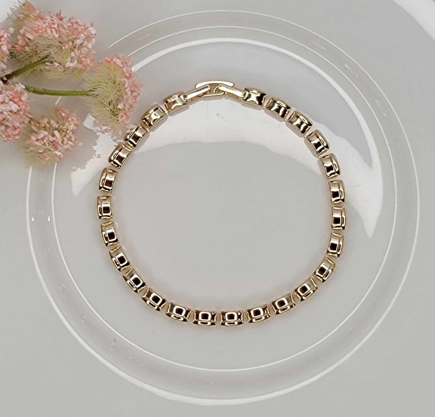 BETTYOH INC - OVAL CZ TENNIS BRACELET.