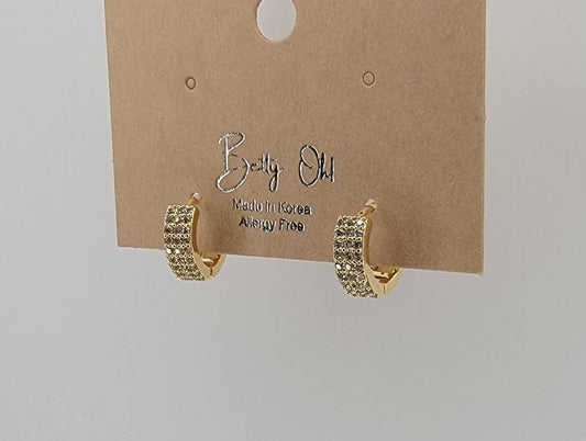 BETTYOH INC - CZ SMALL CLICKER EARRINGS.