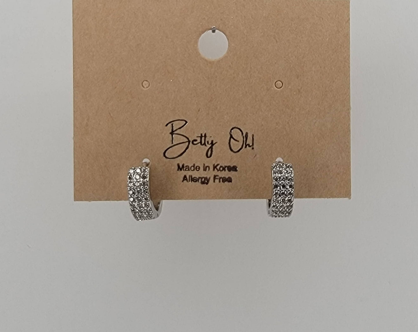 BETTYOH INC - CZ SMALL CLICKER EARRINGS.