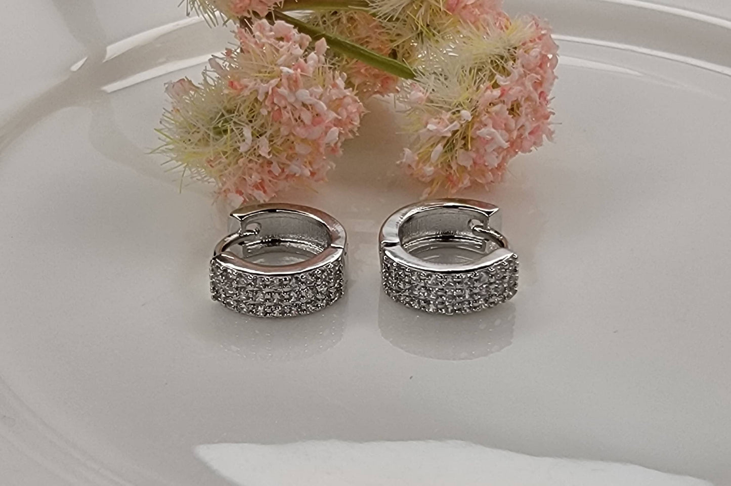 BETTYOH INC - CZ SMALL CLICKER EARRINGS.