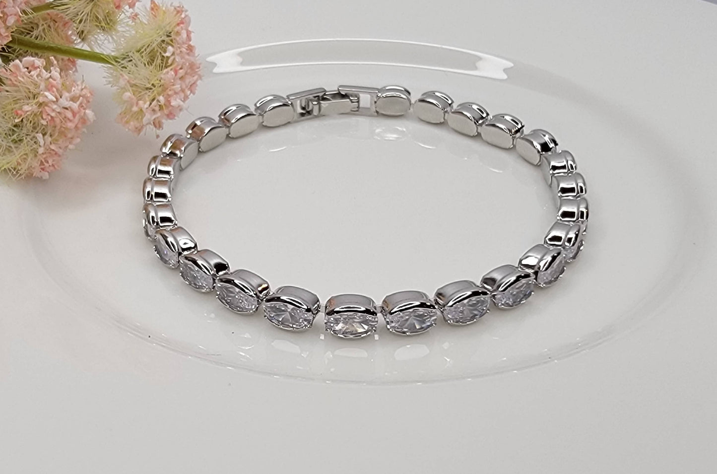 BETTYOH INC - OVAL CZ TENNIS BRACELET.